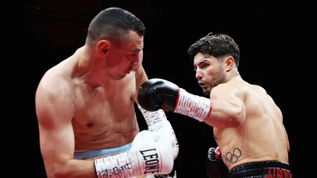 Josh Kelly hits Flavius Biea during their super welterweight fight at Utilita Arena on June 6, 2025, in Newcastle upon Tyne, England.